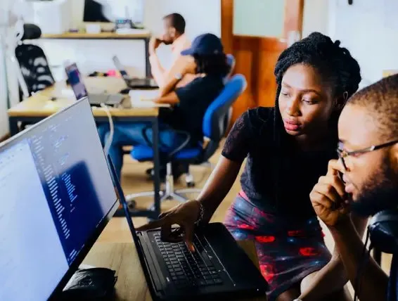 Developers collaborating over code
